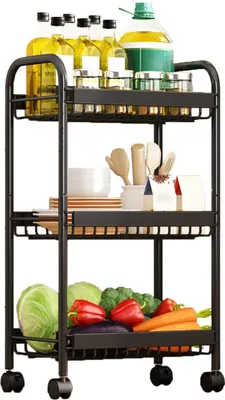 A three-tiered metal serving cart filled with various items, including bottles of oil, jars, bowls, utensils, and fresh produce.