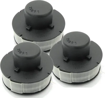 Three black spools with clear plastic wrapping, each with a black cap on top, are arranged on a white background.