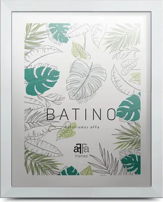 A white picture frame with a botanical print matting.