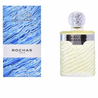 A product shot of a perfume bottle and its box, displayed side-by-side on a white background.