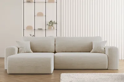 A light-colored sectional sofa in a modern living room.