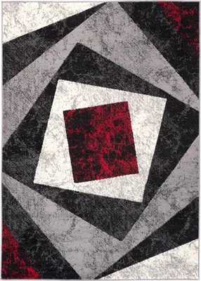 A top-down view of a rug with a geometric pattern.