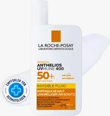 A bottle of La Roche-Posay sunscreen with a promotional badge.