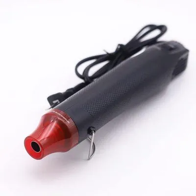 Obrázok produktu pre Elektrická mini teplovzdušná pištoľ – 300 W – 200 °C – čierna – na domáce projekty, sušenie lakov a drobné opravy