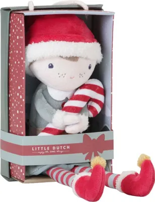 A plush Christmas elf doll in its packaging.