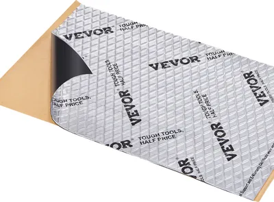 A sheet of sound deadening material with a reflective surface and a brown backing is shown at an angle.