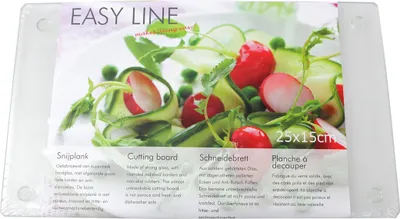 A clear plastic cutting board with a salad on it, presented in its packaging.