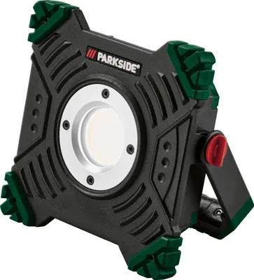 A studio shot of a black and green work light.