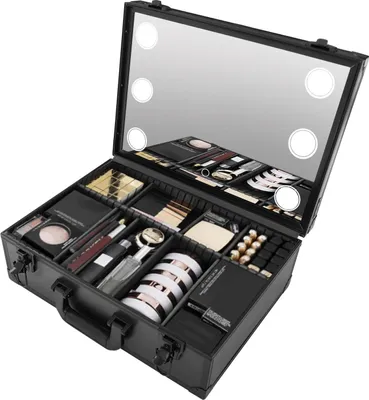 An open black makeup case filled with various makeup products, with a mirrored lid featuring LED lights.