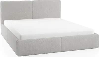 A light gray upholstered bed frame with a white mattress is shown against a white background.