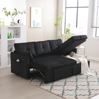 A black sofa bed is shown in a living room setting, with part of it extended to reveal the bed.