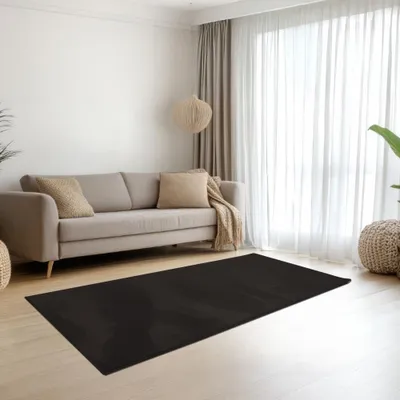 Produktbild von Teppich schwarz samtig weich Hasenfell-Optik mit sanftem Glanz Größe - 60 x 110 cm