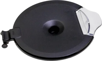 A black circular lid with a clear plastic viewing window, attached to a mechanism on the left side.