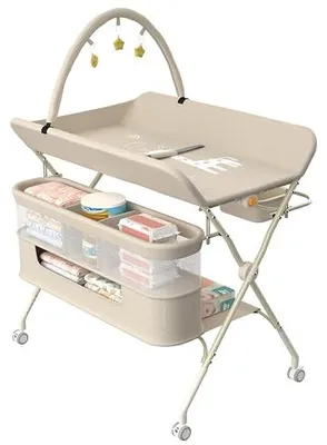 Imagen del producto de Estación para cambiar pañales con cesto lateral, cambiador portátil con altura ajustable y ruedas fijas, organizador de almacenamiento multifuncional para el cuarto del bebé, dimensiones: 75 x 68 x 83–91 cm (ancho), color: crema