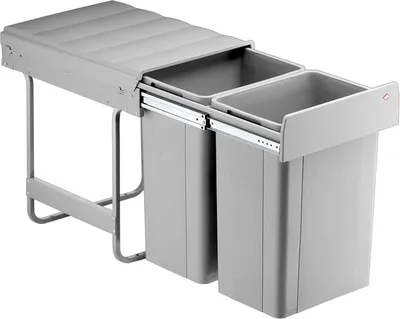 A gray, pull-out trash bin system with two compartments.
