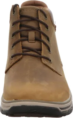 A close-up front view of a brown leather boot.