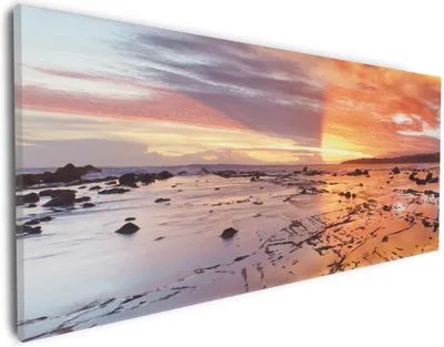 Produktbild von Wallario Premium Leinwandbild Wattwanderung am Meer bei Sonnenuntergang in Größe 30 x 75 cm