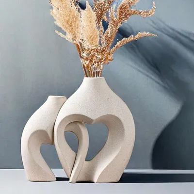 Zdjęcie produktu dla Wazon ceramiczny dekoracyjny, 2 sztuki. Nowoczesny wazon, idealny do dekoracji z traw pampasowych. Wazon w kształcie serca i krzyża, ręcznie wykonany. Pojemnik na suszone kwiaty, idealny do dekoracji wnętrz