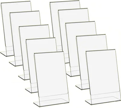 A group of clear acrylic sign holders arranged in a staggered pattern against a white background.