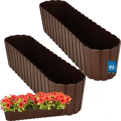 Two brown plastic planters are shown against a white background. One planter is in the foreground, and the other is behind it and slightly to the right. A small planter filled with red flowers is placed in front of the foreground planter.
