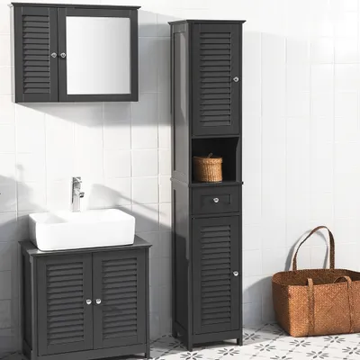A bathroom vanity, a tall cabinet, and a wall-mounted cabinet are displayed in a bathroom setting with tiled walls and floor.