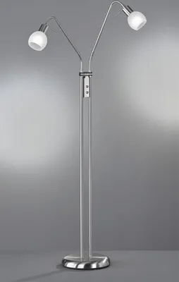 A modern, double-headed floor lamp with a brushed metal finish and frosted glass shades, set against a plain gray background.