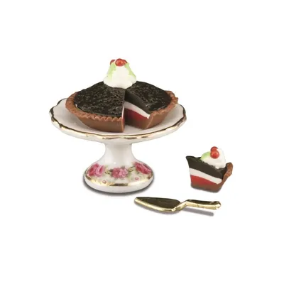 Produktbild von Miniatur Blaubeerkuchen auf Kuchenplatte mit Kuchenschaufel