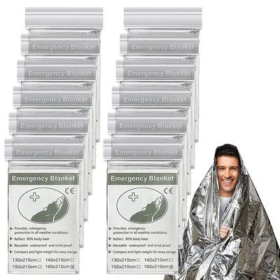 Imagen del producto de Manta térmica plateada, resistente, impermeable, de alta durabilidad, paquete de 12 unidades, dimensiones 210 x 160 cm, ideal para actividades al aire libre