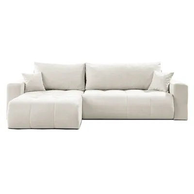 A cream-colored sectional sofa is shown from the front against a white background.