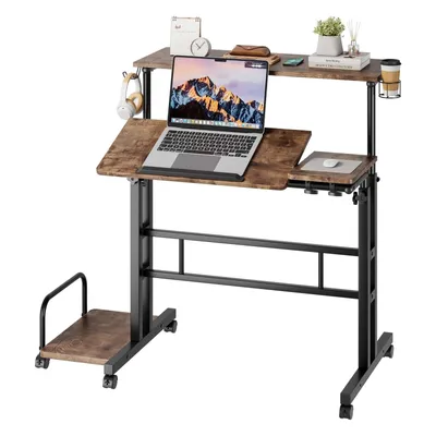 A mobile standing desk with a laptop, mouse, and accessories.