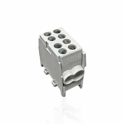 A close-up studio shot of a gray electrical terminal block against a white background.
