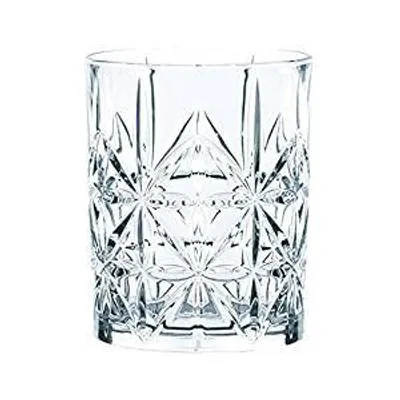 A clear, professional studio shot of a single crystal whisky glass against a white background.