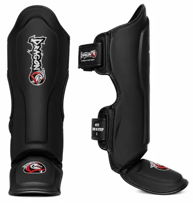 Immagine prodotto di Parastinchi Dragon per Muay Thai, kickboxing e MMA, adatti a uomini, donne e bambini, con una vestibilità perfetta e un'imbottitura ideale, e adatti anche per altre discipline di combattimento. Modello 40721 (nero, taglia M)