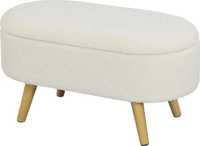 A white, oval-shaped storage ottoman with wooden legs, shown from a slight angle against a white background.