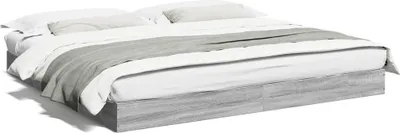 A bed frame with bedding.