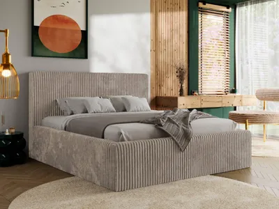 A bedroom scene featuring a bed, bedside table, and a chair.
