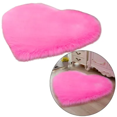 Productafbeelding van Pluche antislipkleed hart roze 40x50