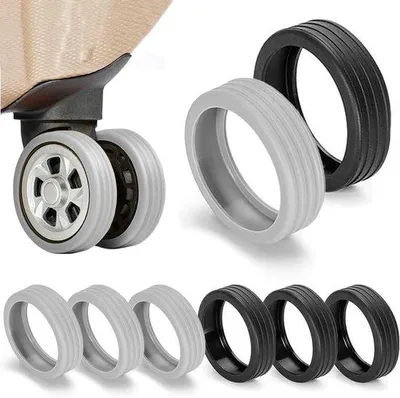 Zdjęcie produktu dla Silikonowe zestawy ochronne do kół – 8 sztuk do uprzęży podróżnych Spinner (czarno-zielone)
