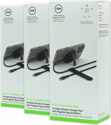 Three boxes of Belkin Boost Charge Pro portable wireless charger pads are shown side-by-side.