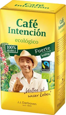 A yellow coffee packaging with a man holding a coffee bean.
