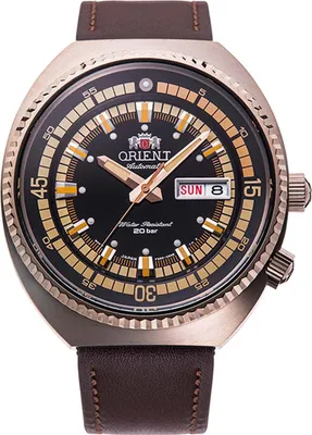 A close-up studio shot of an Orient automatic watch with a black dial, gold accents, and a brown leather strap.