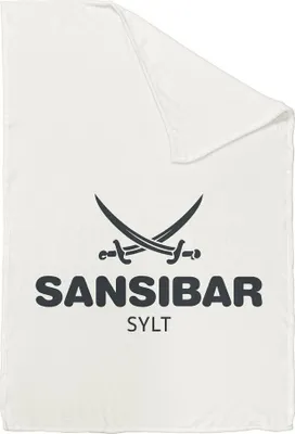 A white fleece blanket with a dark gray logo and text.