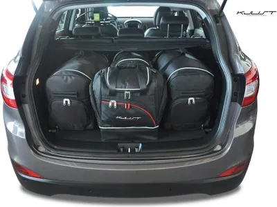 Obrázok produktu pre Tašky do kufra LAND ROVER DISCOVERY SPORT 2014+ 4ks KJUST