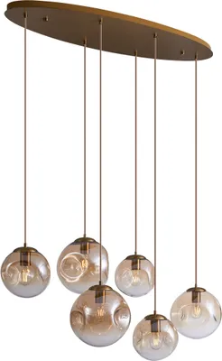 A multi-bulb pendant light fixture with an oval brass ceiling plate and six amber glass globe shades.