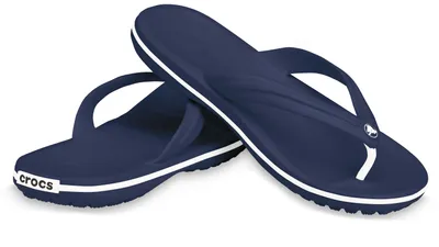 A pair of navy blue Crocs flip-flops with white trim and white branding on a white background.