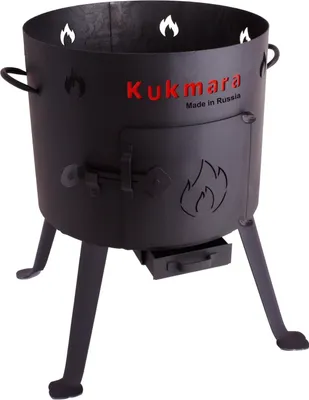A black metal tandoor oven with legs and a small drawer.
