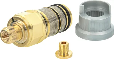 A set of plumbing parts, including a brass cartridge, a silver adapter, and a small brass fitting, are arranged on a white background.