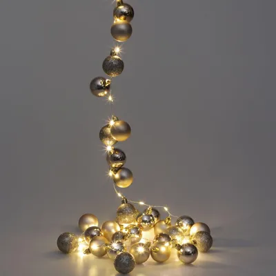 Immagine prodotto di Luci a LED con timer, 2 m, 40 palline color champagne