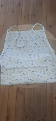 Produktbild von Clayre & Eef Küchenschürze mit Schleifen Blumen 70x85 cm