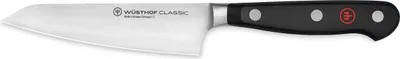A close-up, side view of a kitchen knife on a white background.